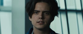 Movie still from “Daniel Isn't Real” (2019), directed by Adam Egypt Mortimer – A person wearing a blue jacket; Close Up shot, Low angle