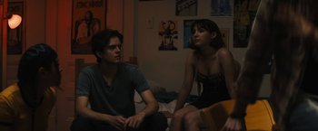 Movie still from “Daniel Isn't Real” (2019), directed by Adam Egypt Mortimer – A man and a woman sitting on a bed; Medium shot, Low angle