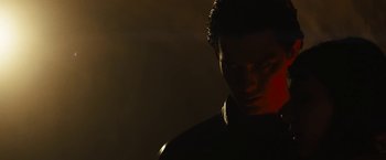 Movie still from “Daniel Isn't Real” (2019), directed by Adam Egypt Mortimer – A person in a dark room; Close Up shot, Low angle