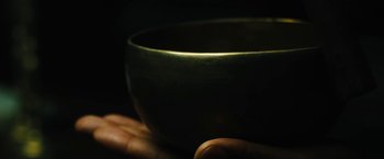 Movie still from “Daniel Isn't Real” (2019), directed by Adam Egypt Mortimer – A person holding a bowl in their hand; Extreme Close Up shot, High angle