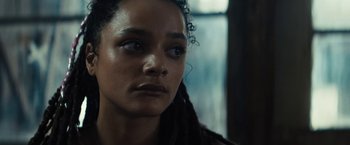 Movie still from “Daniel Isn't Real” (2019), directed by Adam Egypt Mortimer – A person with dreadlocks; Close Up shot, Over the shoulder angle