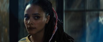 Movie still from “Daniel Isn't Real” (2019), directed by Adam Egypt Mortimer – A person with dreads; Close Up shot, Over the shoulder angle