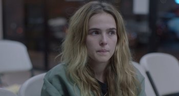 Movie still from “Flower” (2017), directed by Max Winkler – A person with long hair; Close Up shot, Over the shoulder angle