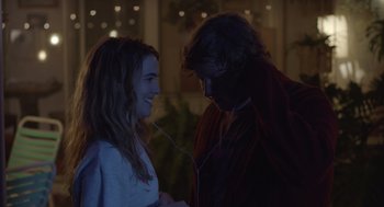 Movie still from “Flower” (2017), directed by Max Winkler – A man and a woman standing next to each other; Medium shot, Over the shoulder angle