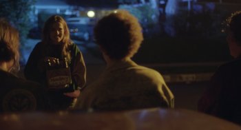 Movie still from “Flower” (2017), directed by Max Winkler – Two people standing in front of each other at night; Medium shot, Over the shoulder angle