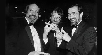 Movie still from “De Palma” (2015), directed by Jake Paltrow – A group of men standing next to each other in tuxedos; Close Up shot, Low angle