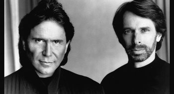 Movie still from “De Palma” (2015), directed by Jake Paltrow – A black - and - white photo of two men standing next to each other; Close Up shot, Low angle