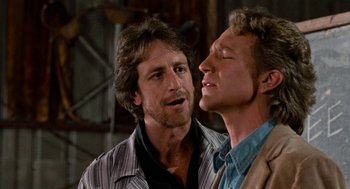 Movie still from “De Palma” (2015), directed by Jake Paltrow – A man and a woman singing together in a room; Close Up shot, Over the shoulder angle