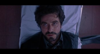 Movie still from “De Palma” (2015), directed by Jake Paltrow – A person laying in a bed; Close Up shot, Overhead angle