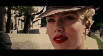 Movie still from “De Palma” (2015), directed by Jake Paltrow – A person wearing a hat and lipstick; Close Up shot, Low angle