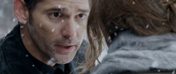 Movie still from “Deadfall” (2012), directed by Stefan Ruzowitzky – A person with long hair; Close Up shot, Over the shoulder angle