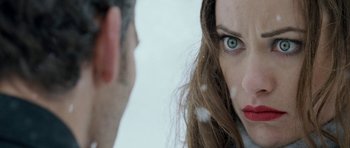 Movie still from “Deadfall” (2012), directed by Stefan Ruzowitzky – A woman's face and a man's face; Close Up shot, Over the shoulder angle