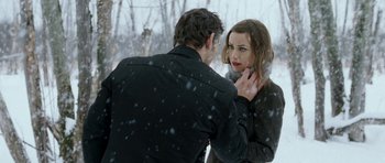 Movie still from “Deadfall” (2012), directed by Stefan Ruzowitzky – A man and a woman in the snow looking at each other; Medium shot, Over the shoulder angle