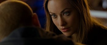 Movie still from “Deadfall” (2012), directed by Stefan Ruzowitzky – A woman's face in the dark; Close Up shot, Over the shoulder angle