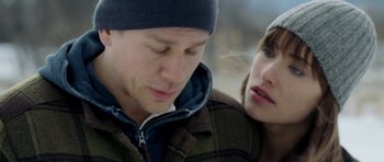 Movie still from “Deadfall” (2012), directed by Stefan Ruzowitzky – A man and a woman looking at one another; Close Up shot, Over the shoulder angle