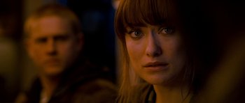 Movie still from “Deadfall” (2012), directed by Stefan Ruzowitzky – A woman's face in the dark; Close Up shot, Over the shoulder angle
