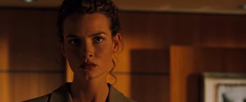 Movie still from “Deep Blue Sea” (1999), directed by Renny Harlin – A person wearing a jacket; Close Up shot, Over the shoulder angle