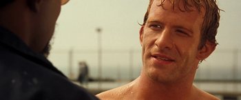 Movie still from “Deep Blue Sea” (1999), directed by Renny Harlin – A man's face with water on his face; Close Up shot, Over the shoulder angle