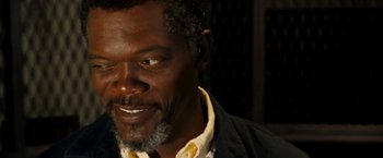 Movie still from “Deep Blue Sea” (1999), directed by Renny Harlin – A person with a beard; Close Up shot, Over the shoulder angle