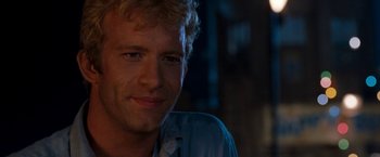 Movie still from “Deep Blue Sea” (1999), directed by Renny Harlin – A man's face in the dark; Close Up shot, Over the shoulder angle