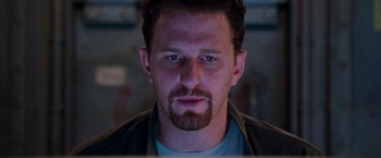 Movie still from “Deep Blue Sea” (1999), directed by Renny Harlin – A person wearing a jacket; Close Up shot, Low angle