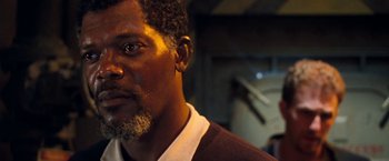 Movie still from “Deep Blue Sea” (1999), directed by Renny Harlin – A person with a beard; Close Up shot, Low angle