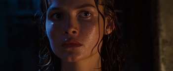 Movie still from “Deep Blue Sea” (1999), directed by Renny Harlin – A person with wet hair; Close Up shot, Low angle