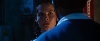 Movie still from “Deep Blue Sea” (1999), directed by Renny Harlin – A person looking at the camera; Close Up shot, Over the shoulder angle