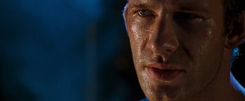 Movie still from “Deep Blue Sea” (1999), directed by Renny Harlin – A man's face with water on his face; Extreme Close Up shot, Low angle