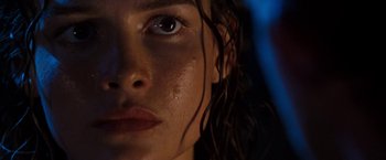 Movie still from “Deep Blue Sea” (1999), directed by Renny Harlin – A woman's face with water on her face; Extreme Close Up shot, Low angle