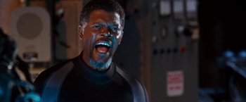 Movie still from “Deep Blue Sea” (1999), directed by Renny Harlin – A person with his mouth wide open; Close Up shot, Low angle