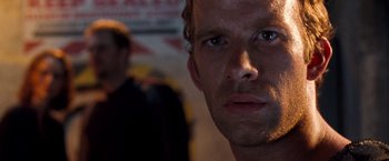 Movie still from “Deep Blue Sea” (1999), directed by Renny Harlin – A man's face in the dark; Close Up shot, Low angle