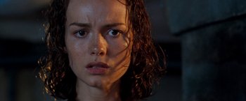 Movie still from “Deep Blue Sea” (1999), directed by Renny Harlin – A woman's face in the dark; Close Up shot, Low angle