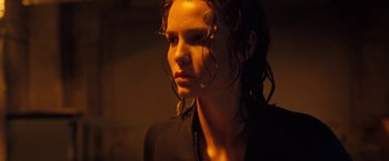 Movie still from “Deep Blue Sea” (1999), directed by Renny Harlin – A person wearing a black shirt; Close Up shot, Low angle