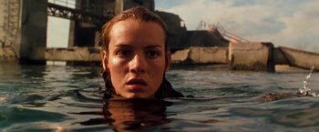 Movie still from “Deep Blue Sea” (1999), directed by Renny Harlin – A woman in the water looking into the camera; Close Up shot, Low angle