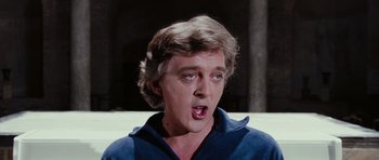 Movie still from “Deep Red” (1975), directed by Dario Argento – A man with a surprised look on his face; Close Up shot, Low angle