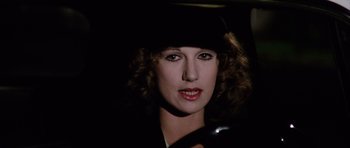 Movie still from “Deep Red” (1975), directed by Dario Argento – A person wearing a hat; Close Up shot, Low angle
