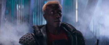 Movie still from “Demolition Man” (1993), directed by Marco Brambilla – A person wearing a leather jacket; Close Up shot, Low angle
