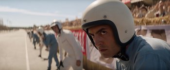 Movie still from “Ford v Ferrari” (2019), directed by James Mangold – A person with a helmet on; Close Up shot, Low angle