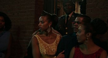 Movie still from “Detroit” (2017), directed by Kathryn Bigelow – A group of people standing next to each other; Medium shot, Over the shoulder angle