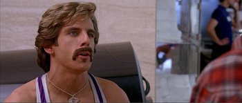 Movie still from “Dodgeball: A True Underdog Story” (2004), directed by Rawson Marshall Thurber – A person with a beard and a mustache; Close Up shot, Low angle