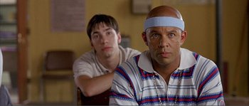 Movie still from “Dodgeball: A True Underdog Story” (2004), directed by Rawson Marshall Thurber – Two men sitting in front of each other in a room; Close Up shot, Low angle