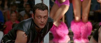 Movie still from “Dodgeball: A True Underdog Story” (2004), directed by Rawson Marshall Thurber – A person wearing a leather jacket; Close Up shot, Low angle