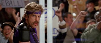 Movie still from “Dodgeball: A True Underdog Story” (2004), directed by Rawson Marshall Thurber – A man with a purple headband is looking at the camera; Close Up shot, Low angle