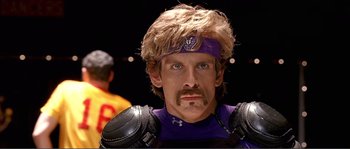 Movie still from “Dodgeball: A True Underdog Story” (2004), directed by Rawson Marshall Thurber – A person wearing a helmet; Close Up shot, Low angle