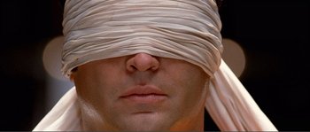 Movie still from “Dodgeball: A True Underdog Story” (2004), directed by Rawson Marshall Thurber – A person with a blindfold; Extreme Close Up shot, High angle