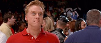 Movie still from “Dodgeball: A True Underdog Story” (2004), directed by Rawson Marshall Thurber – A person wearing a red shirt; Close Up shot, Low angle