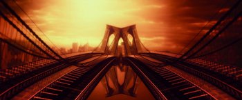 Movie still from “Dog” (2022), directed by Reid Carolin – A view of a bridge with a reflection of a city in the water; Extreme Wide shot, Low angle