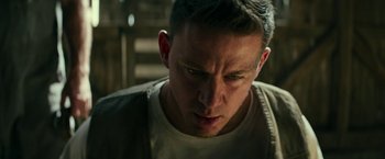 Movie still from “Dog” (2022), directed by Reid Carolin – A person with his eyes wide open; Close Up shot, Low angle