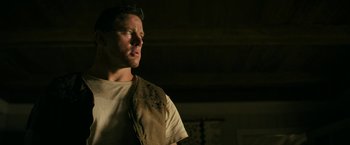 Movie still from “Dog” (2022), directed by Reid Carolin – A person wearing a vest; Close Up shot, Low angle